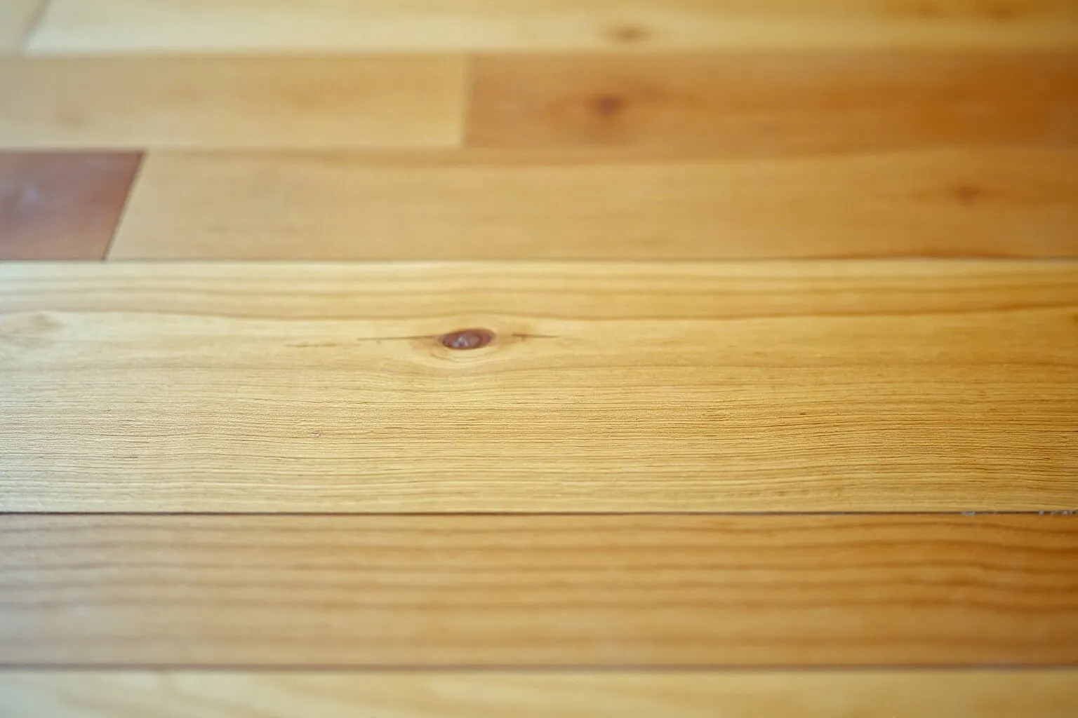 Primo piano di un pavimento in legno a olio